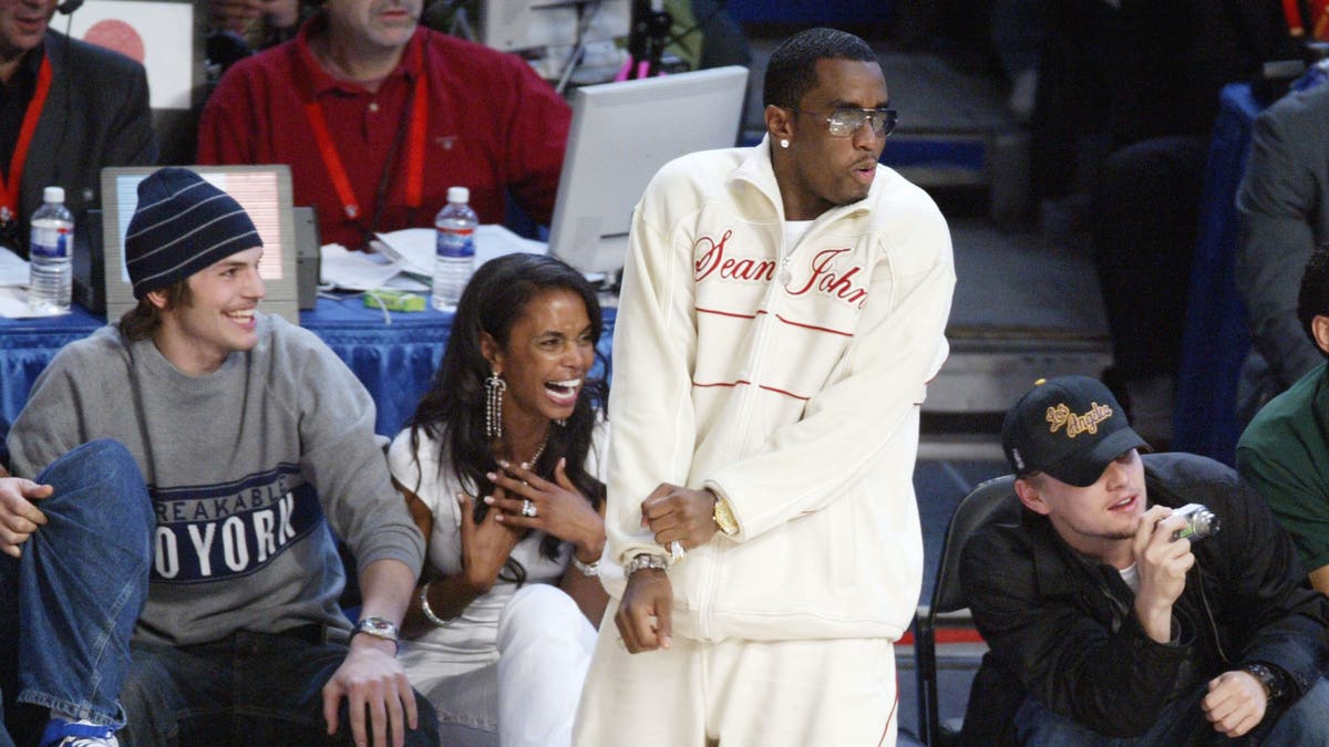 Ashton Kutcher, Kim Porter, Diddy et Leonardo DiCaprio au NBA All-Star Game 2004